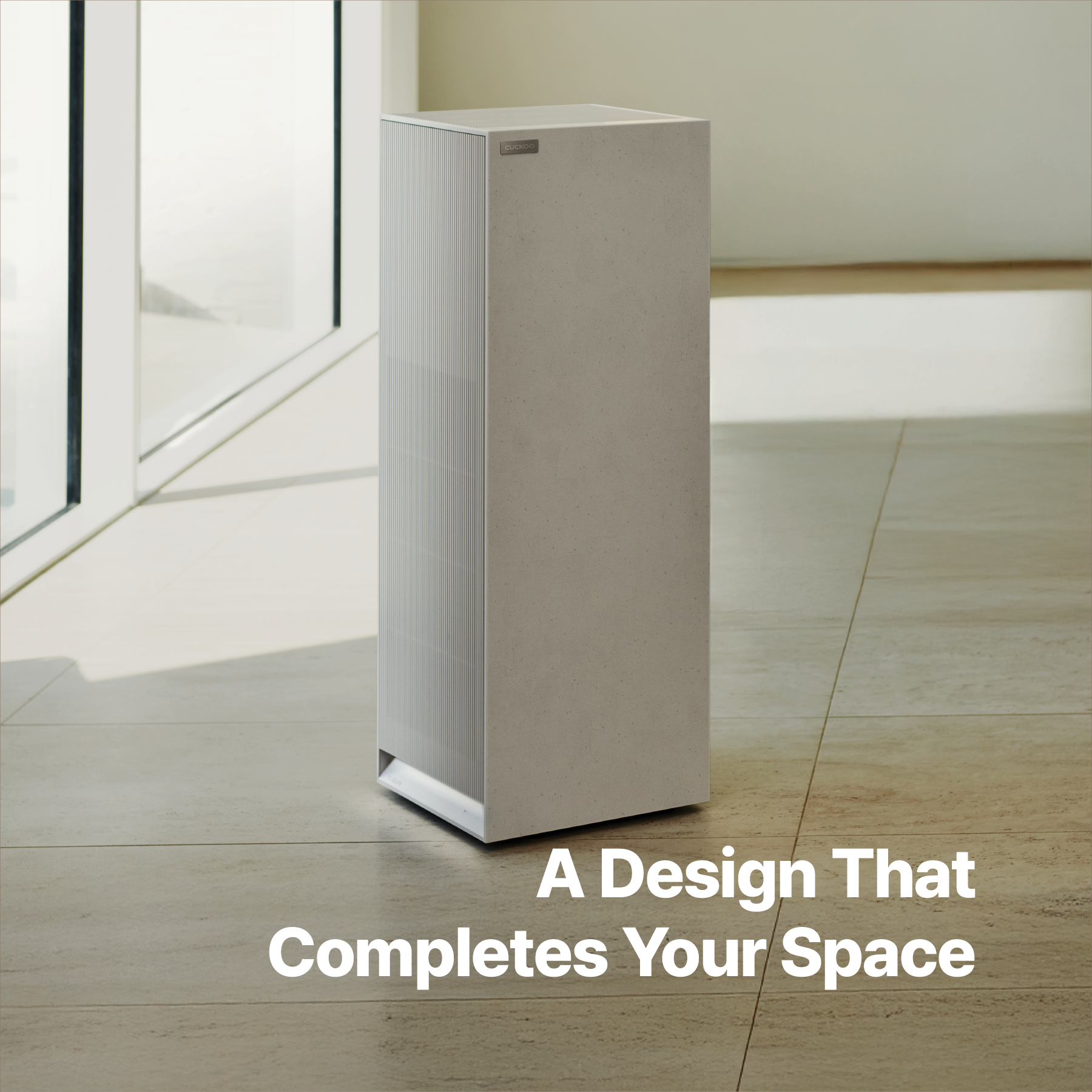 Earth Warm White Inspure Heritage air purifier in a modern room, with text overlay: "A Design That Completes Your Space." (CAC-AH2810FNW)