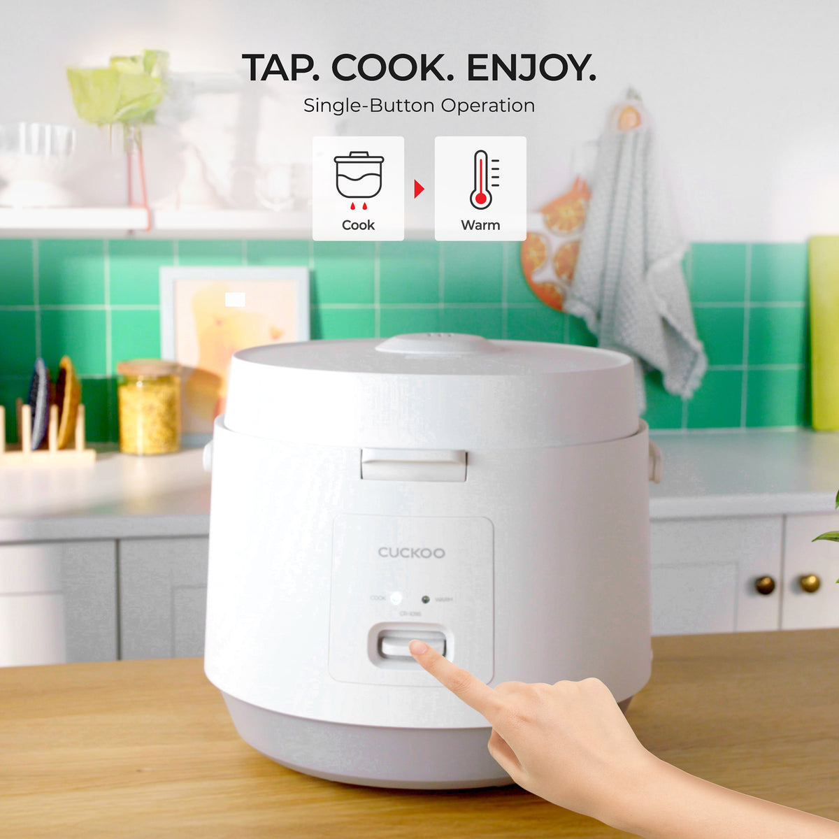 White rice cooker on a kitchen counter with a hand pressing a button, labeled 'Tap. Cook. Enjoy.'