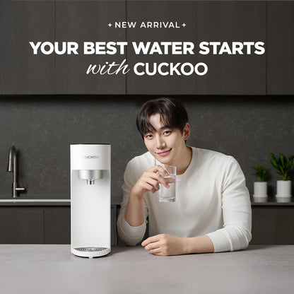 Cuckoo water purifier image with text 'NEW ARRIVAL' and 'YOUR BEST WATER STARTS with CUCKOO'. Features a white counter top water purifier and a man smiling while holding a glass of water.